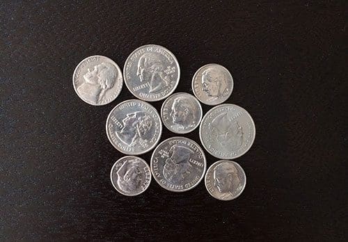 Figure 1: An example image containing touching objects. Our goal is to detect and extract each of these coins individually.